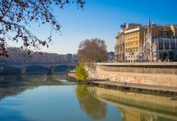 Fototapeta na wymiar Rome (Italy) - The monumental Lungotevere in historic center of Rome. Here in particular the gothic church named 'Chiesa del Sacro Cuore del Suffragio'