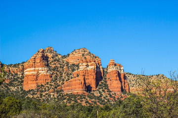Red Red Rock Mountains Showing White Layers