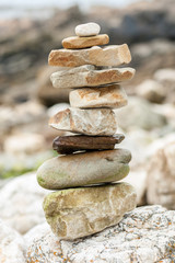 Fototapeta na wymiar A stack of stones on the beach