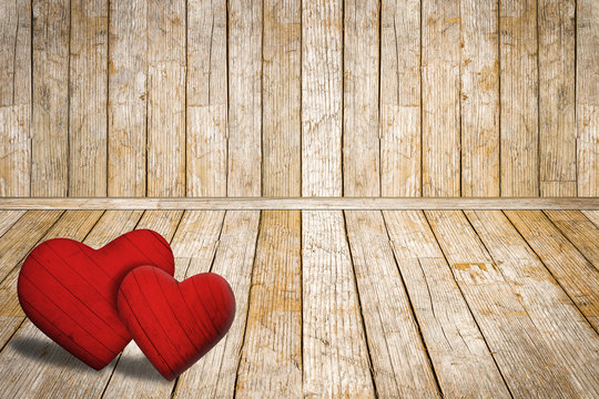 Valentine's Day background, red hearts on old wooden floor