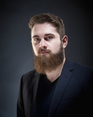 Fototapeta premium Portrait of a Teenage Hipster with Beard