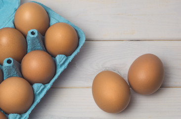 Chicken brown fresh eggs in a tray. 