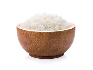 rice in wood bowl on white background
