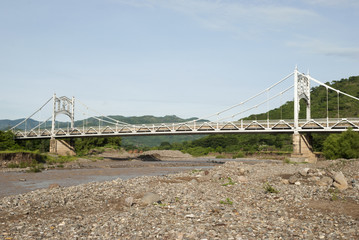 Old riveted steel bridgen Tamazulapa in Jutiapa. Guatemala. Inaugurated on Thursday, September 16, 1937.