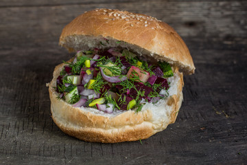 vegetable burger (bun, beet, potatoes, onions, cucumber, dill and greens and others)