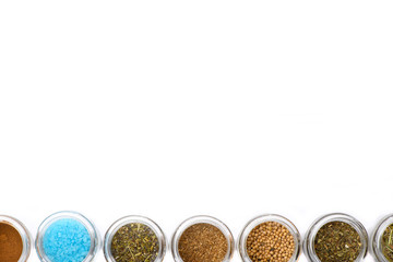 Jars of spices isolated on white background. Cuisine and taste