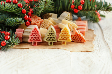 Tricolor fir tree shaped pasta and fir branches