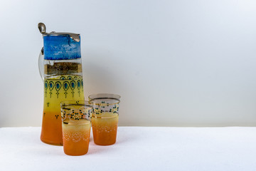 Hand crafted yellow orange antique carafe and glasses set
