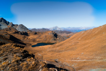 A lake in autumn in the Alps