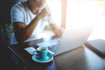 A man working at coffee shop.
