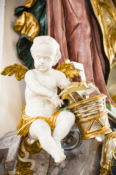 Putte in katholischer Kirche in Oberschwaben