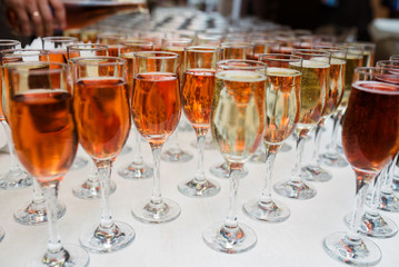 Glasses with champagne and cocktails.