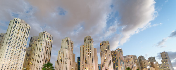 Dubai Marina skyline at night as seen from the promenade