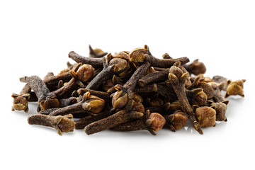 A pile of dry cloves isolated on white.