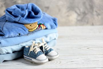 Baby Boy Clothes and shoes Background. 