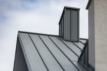 chimney on the sloping roof