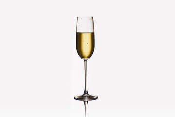 A glass of champagne, isolated white background composition