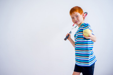 Boy playing tennis