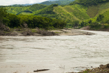 River called Motagua cloudy winter in El Progreso, Guatemala. Turbid river.