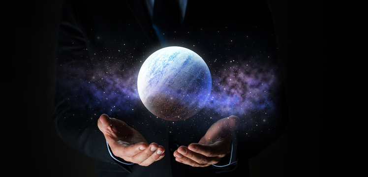 close up of businessman with planet hologram