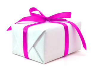 White gift box with pink ribbon bow, isolated on white