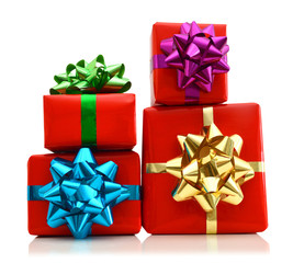 Red gift box with colorful bow isolated on white