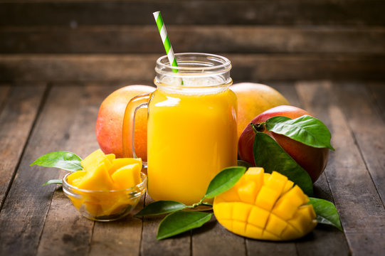 Fresh mango smoothie in the glass