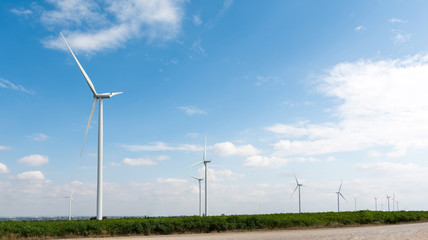 Fototapeta na wymiar Wind turbine field for electricity generation.
