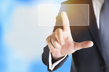 Close up of businessman touching digital screen with finger 