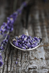 Obraz na płótnie Canvas Close-up of the spoon with dry lavender.