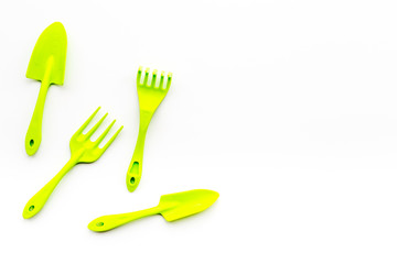 Gardening equipment concept on white background top view copy space