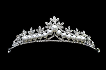 tiara with pearls isolated on a black background - obrazy, fototapety, plakaty