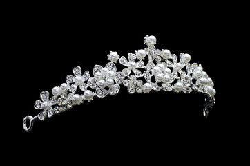 tiara with pearls isolated on a black background - obrazy, fototapety, plakaty