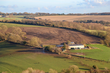 Vehicle Tracks Behind a Farm Building