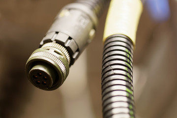 Connector and wire used for industrial puposes. Short depth of field