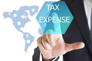 Businessman hand touching TAX EXPENSE button on virtual screen