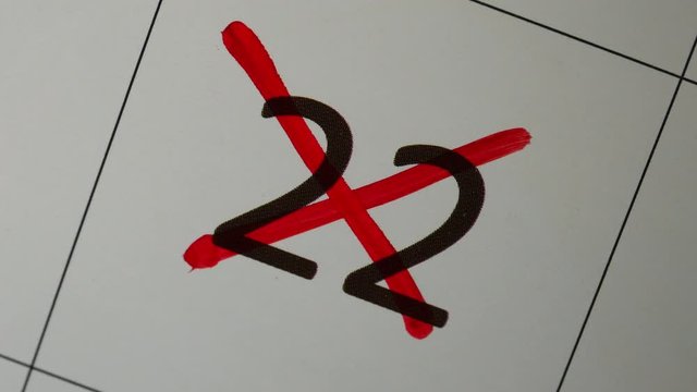 The Red Marker Crossing 22th Date On The Calendar