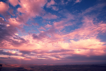 Fototapeta na wymiar Beautiful dramatic sunset over desert