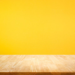 Wood table top on color background. .