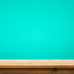 Wood table top on color background. .