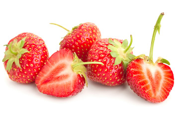 many berries ripe juicy strawberries on a white table
