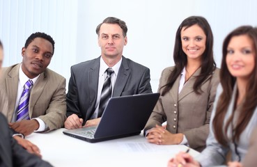 businessman and business team sitting at Desk