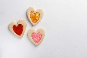 Pastries in shape of heart. St Valentine’s Day conception. Top view with copy space for text