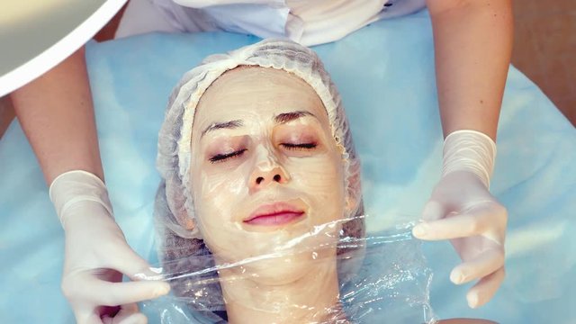 Skin Rejuvenation Treatment massage with facial cream, 4k footage.
