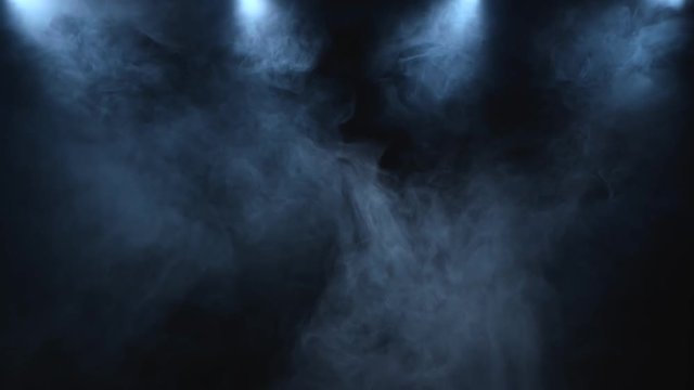 Beautiful smoke cloud isolated on black background with lighting