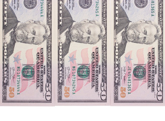 Three 50 dollar banknotes isolated on white background.