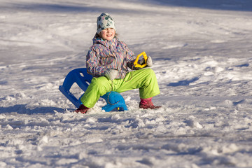 Fototapeta na wymiar Happy girl in winter outdoors
