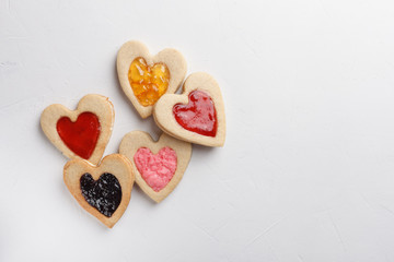 Fototapeta na wymiar Pastries in shape of heart. St Valentine’s Day conception. Top view with copy space for text