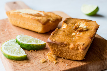 Rectangle Mini Lime Cakes on Wooden surface.