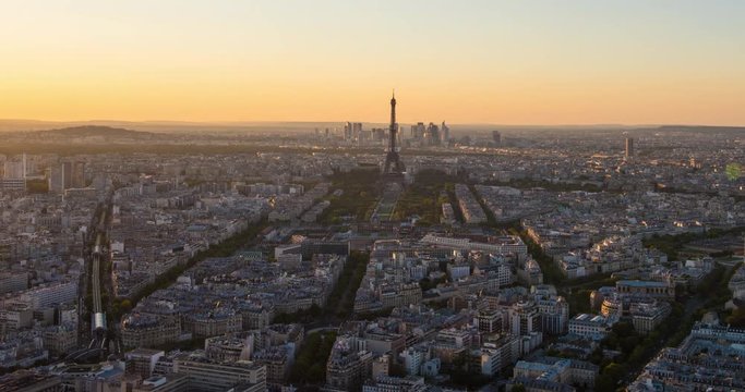 PARIS, FRANCE  – SEPTEMBER 2016 : Timelapse over central Paris during a beautiful sunset  with Eiffel Tower and skyline in view